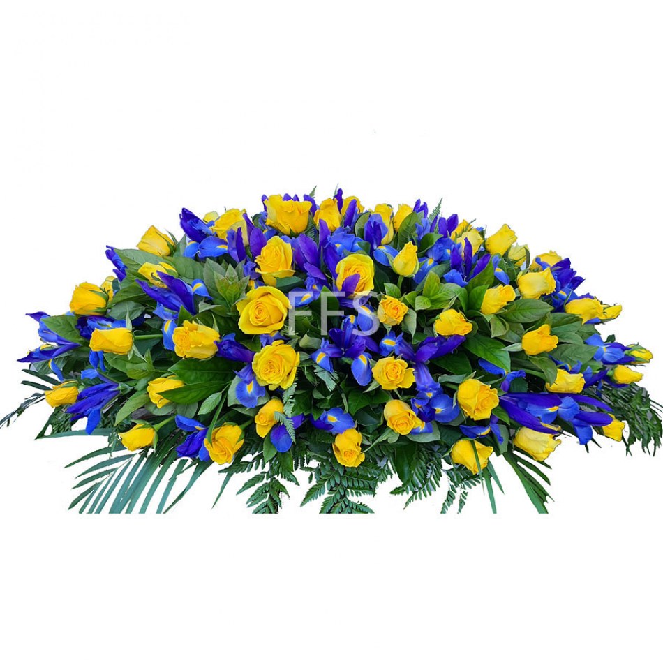 Casket of Flowers with Yellow Roses & Iris The Funeral Flower Shop